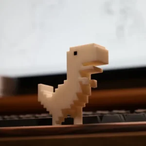 Dinosaurio pixel de 7.7 cm | Figura geek para escritorio